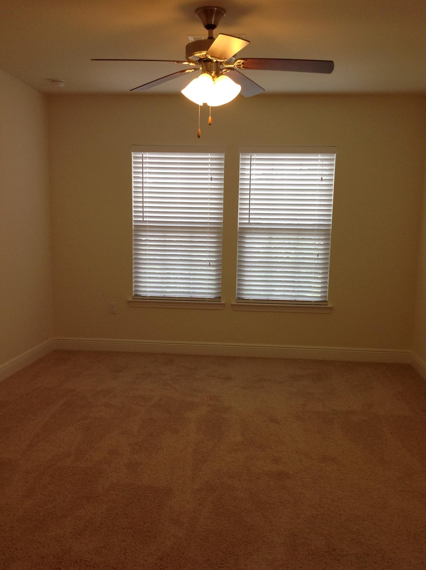 2131 Wilsons Plover Circle Navarre, FL 32566 - Photo 11 of 19 a view of a livingroom with a ceiling fan and window