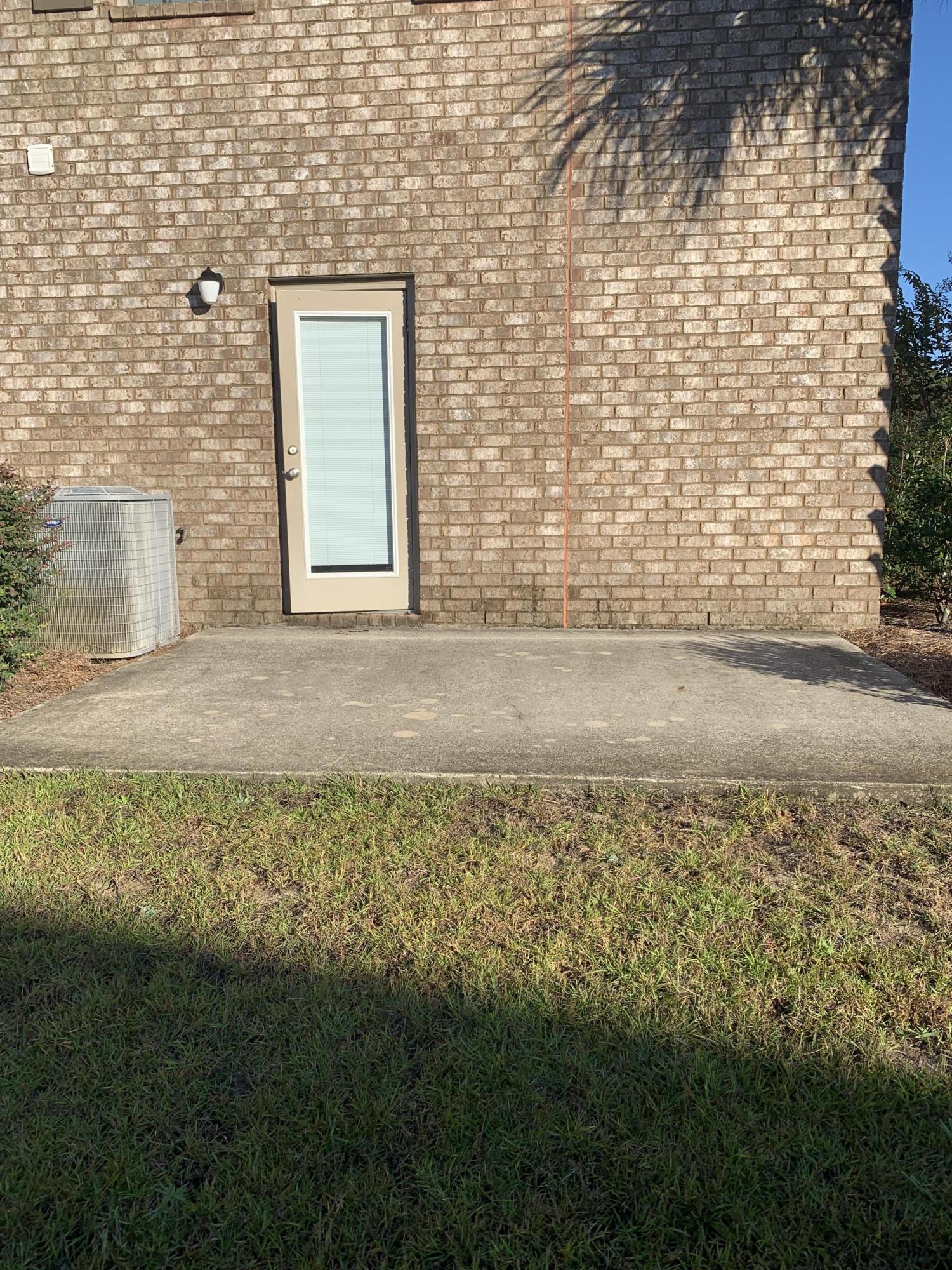 2131 Wilsons Plover Circle Navarre, FL 32566 - Photo 15 of 19 a view of a door and chair