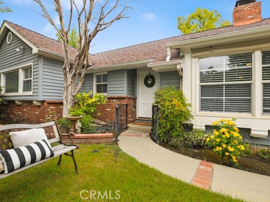 6237 Hamilton Lane La Crescenta, CA 91214 - Photo 32 of 45 a view of a house with potted plants and a large tree