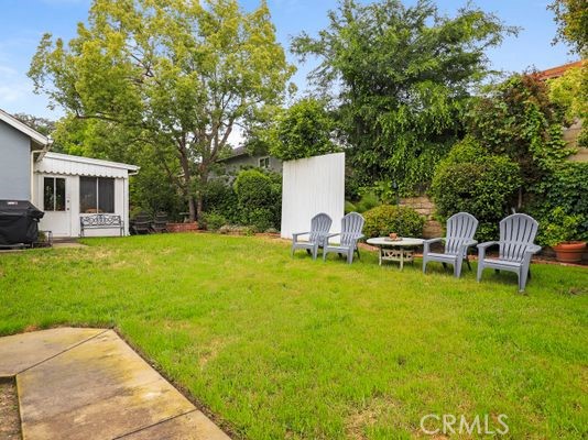 6237 Hamilton Lane La Crescenta, CA 91214 - Photo 35 of 45 a view of a house with backyard sitting area and garden