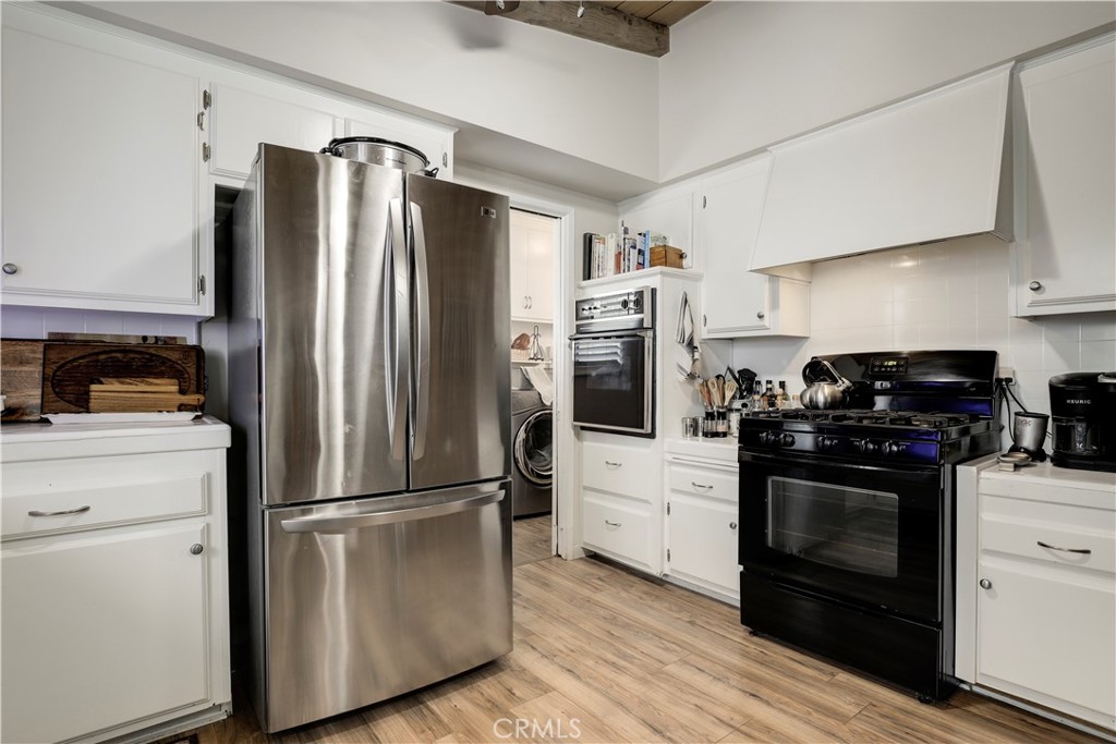 6237 Hamilton Lane La Crescenta, CA 91214 - Photo 9 of 45 a kitchen with stainless steel appliances a refrigerator sink and stove