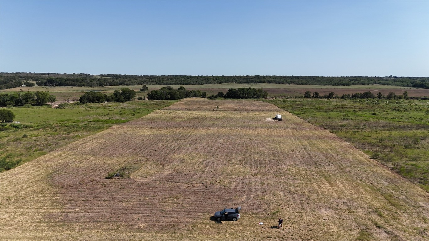 1637 County Road 273 Cameron, TX 76520 - Photo 6 of 14 a view of a field with an ocean