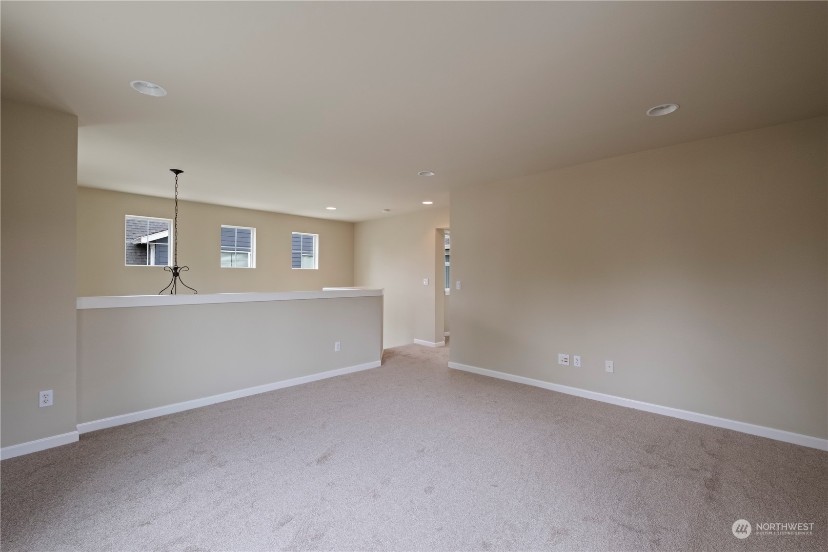 574 Lyons Place Northeast Renton, WA 98059 - Photo 18 of 39 an empty room with a empty space and windows