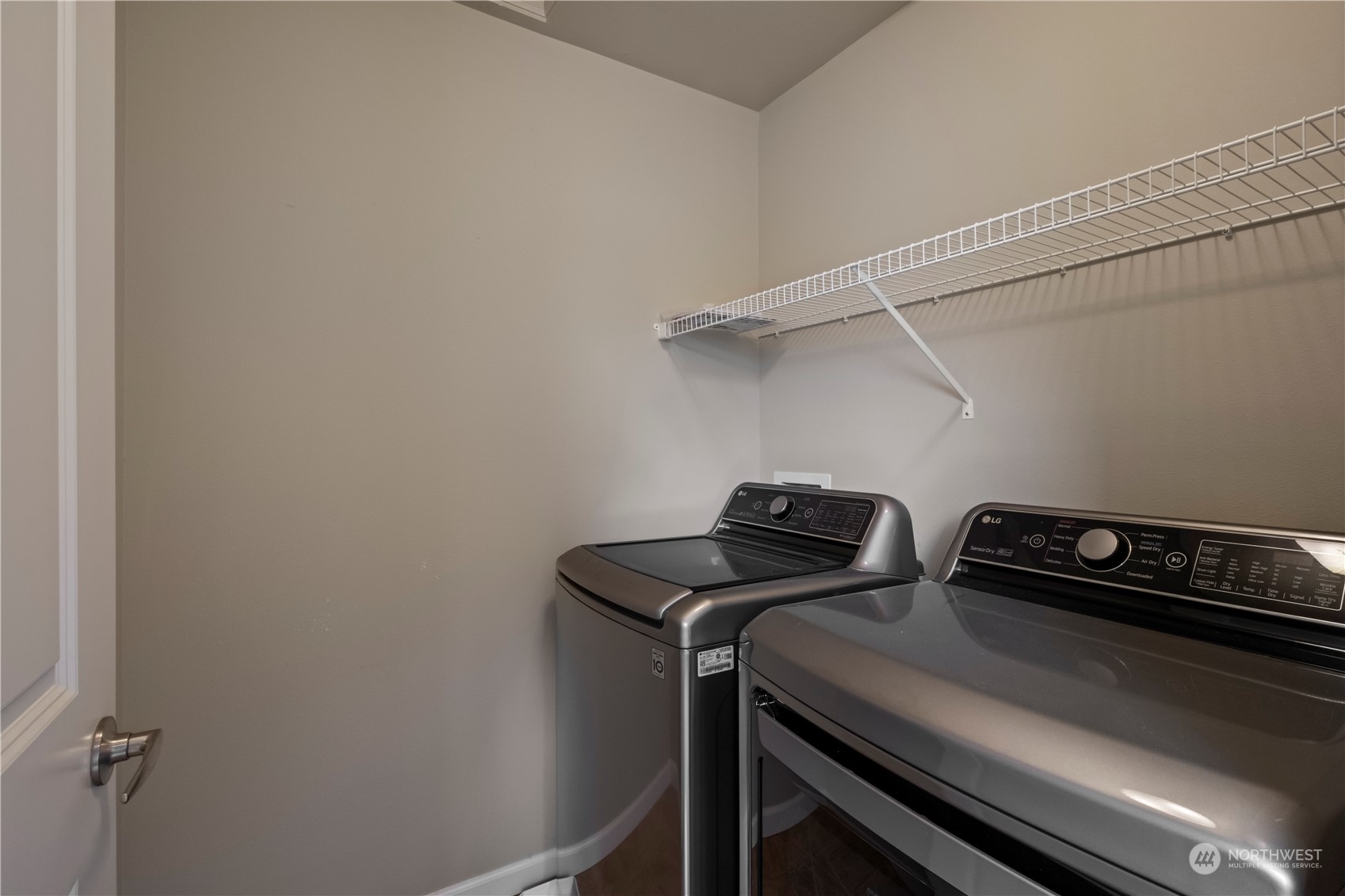 574 Lyons Place Northeast Renton, WA 98059 - Photo 22 of 39 a utility room with dryer and washer