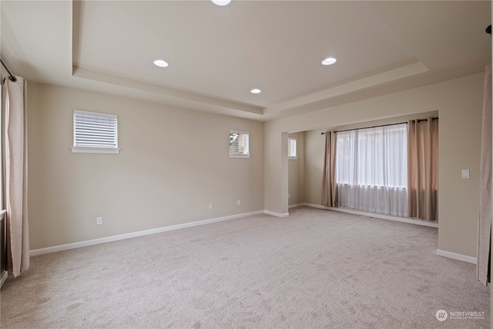 574 Lyons Place Northeast Renton, WA 98059 - Photo 23 of 39 a view of an empty room with a window