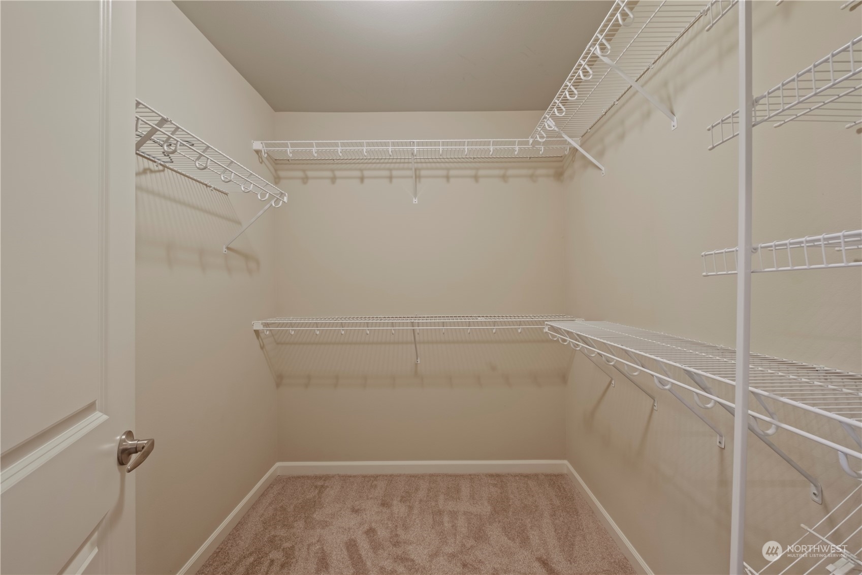 574 Lyons Place Northeast Renton, WA 98059 - Photo 26 of 39 a view of a room with racks on the wall