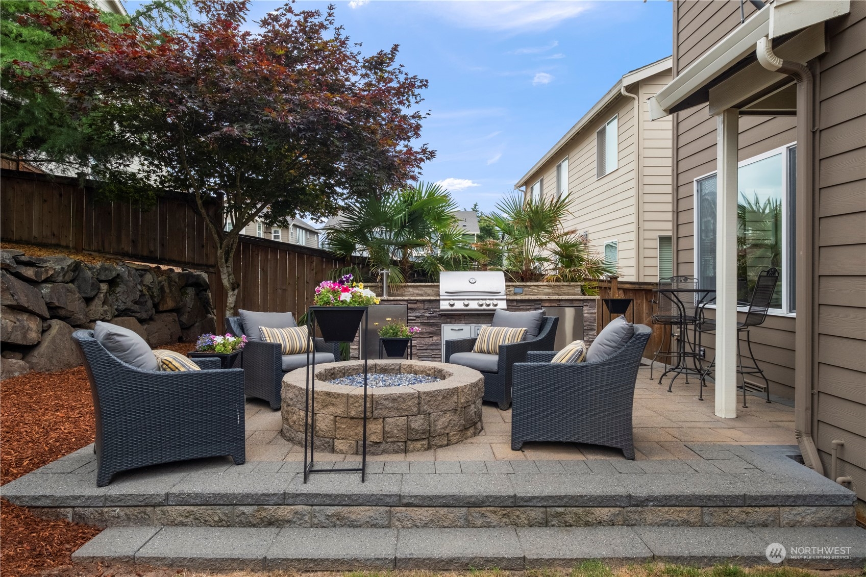 574 Lyons Place Northeast Renton, WA 98059 - Photo 30 of 39 a view of a patio with couches and a fire pit