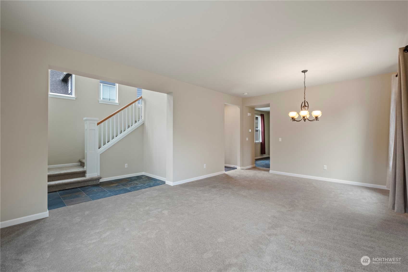 574 Lyons Place Northeast Renton, WA 98059 - Photo 6 of 39 a view of a room with an entryway