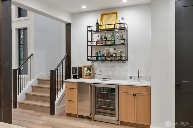 a view of cabinets and wooden floor