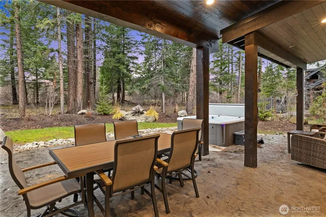 a dining area with furniture and outdoor view