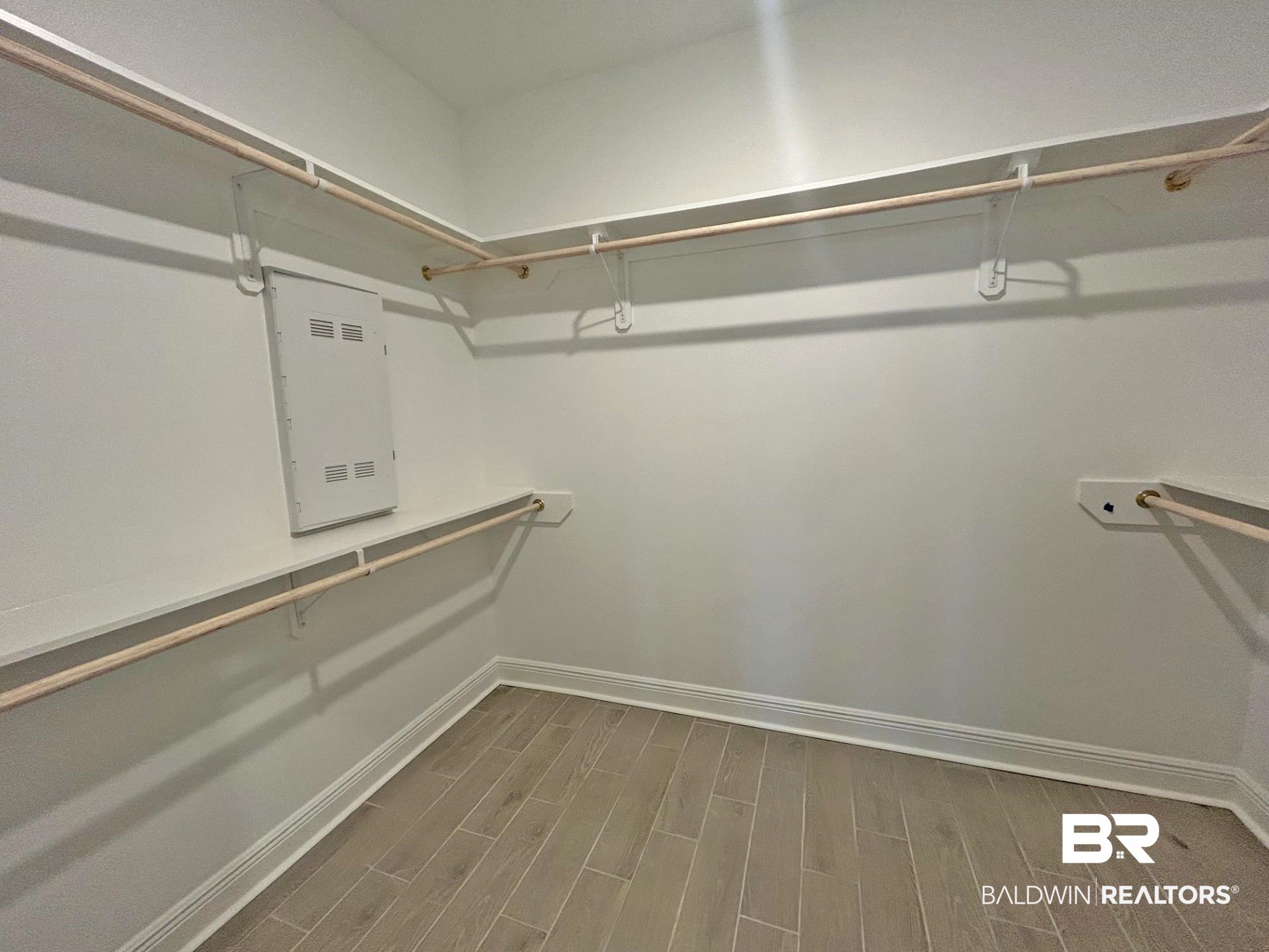 1748 Breckinridge Place Foley, AL 36535 - Photo 12 of 25 Walk in closet featuring wood finish floors and electric panel