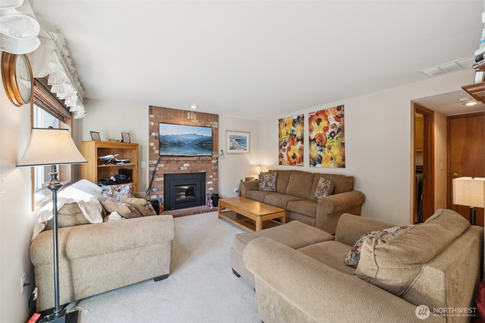 28820 52nd Place South Auburn, WA 98001 - Photo 11 of 33 a living room with furniture and a fireplace