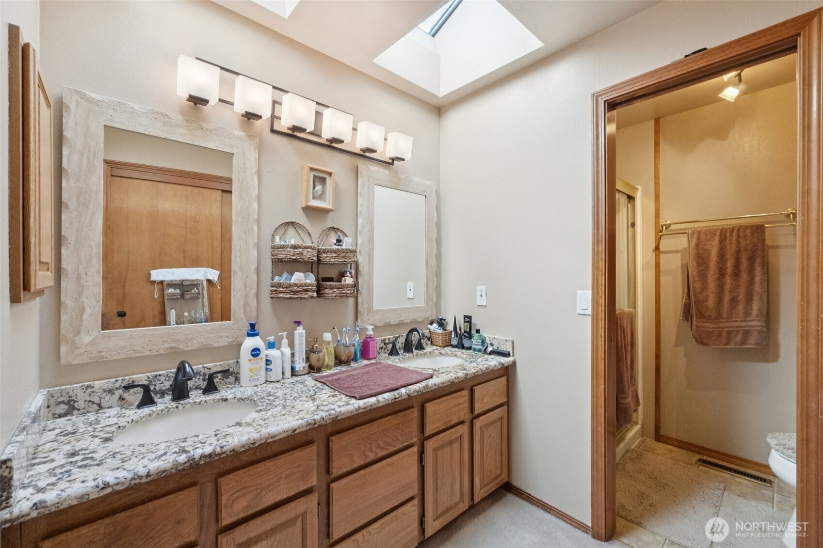28820 52nd Place South Auburn, WA 98001 - Photo 21 of 33 a bathroom with a granite countertop sink and a mirror