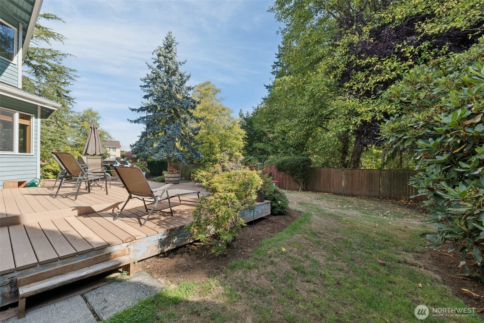 28820 52nd Place South Auburn, WA 98001 - Photo 27 of 33 a view of backyard with seating space and trees in the background