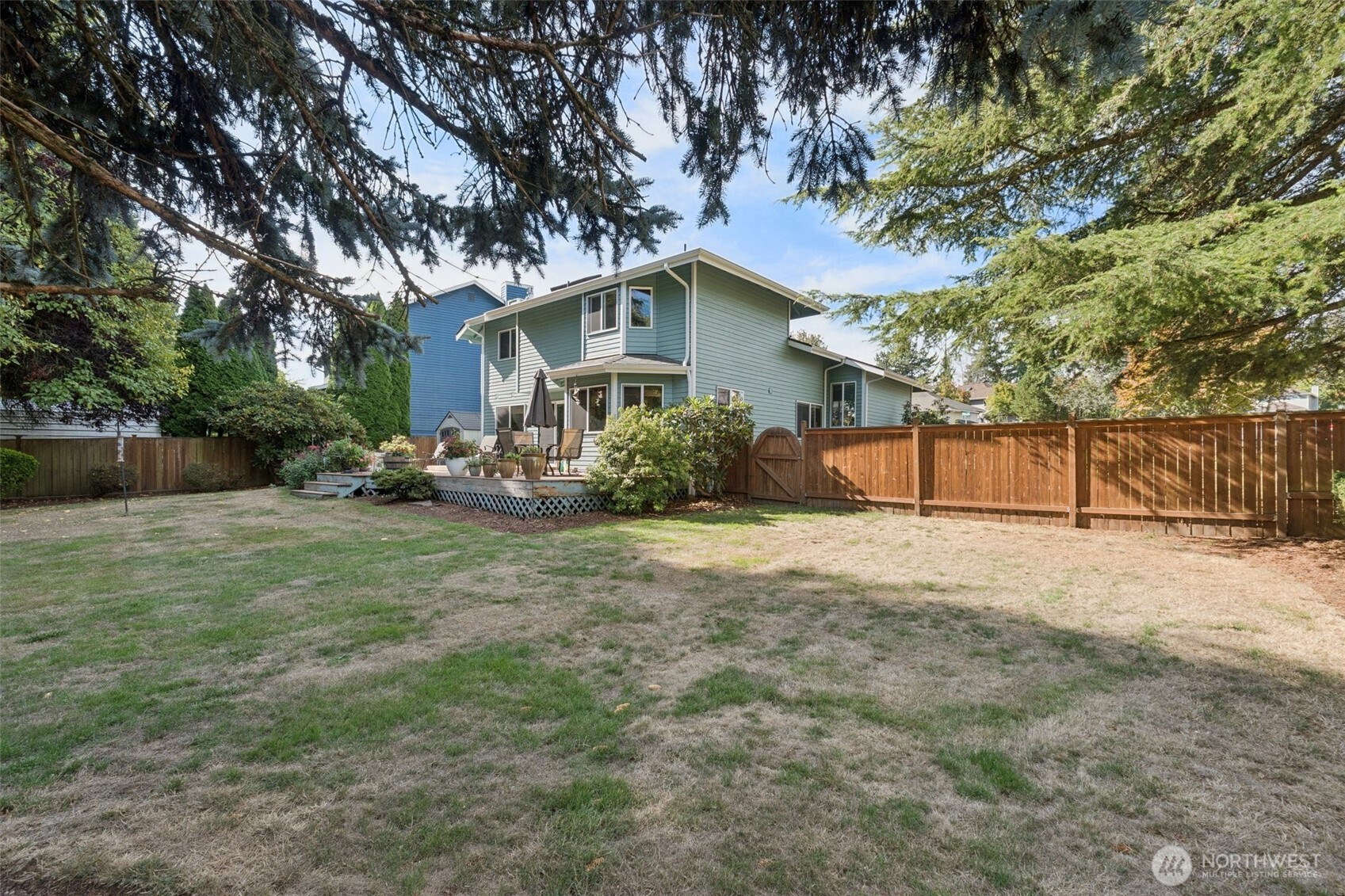 28820 52nd Place South Auburn, WA 98001 - Photo 30 of 33 a backyard of a house with table and chairs