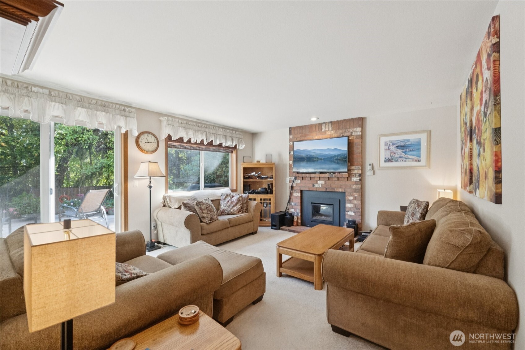 28820 52nd Place South Auburn, WA 98001 - Photo 10 of 33 a living room with furniture large window and a fireplace