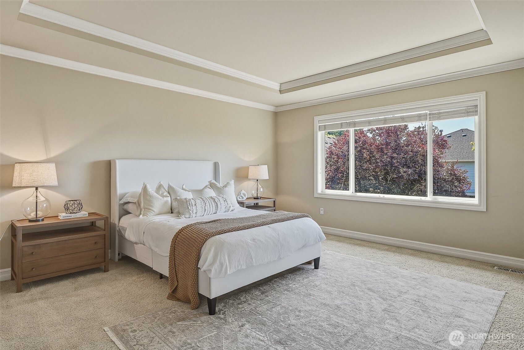 3932 221st Place Southeast Bothell, WA 98021 - Photo 21 of 36 a bedroom with a bed lamp and window