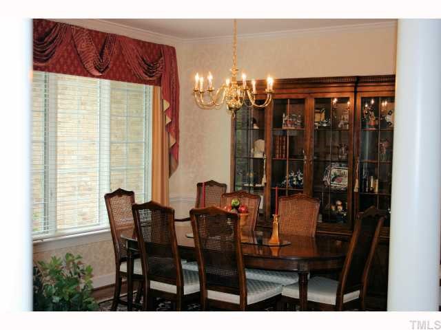 105 Cedar Ridge Way Durham, NC 27705 - Photo 3 of 12 Formal Dining Room separated from Living Room by columns