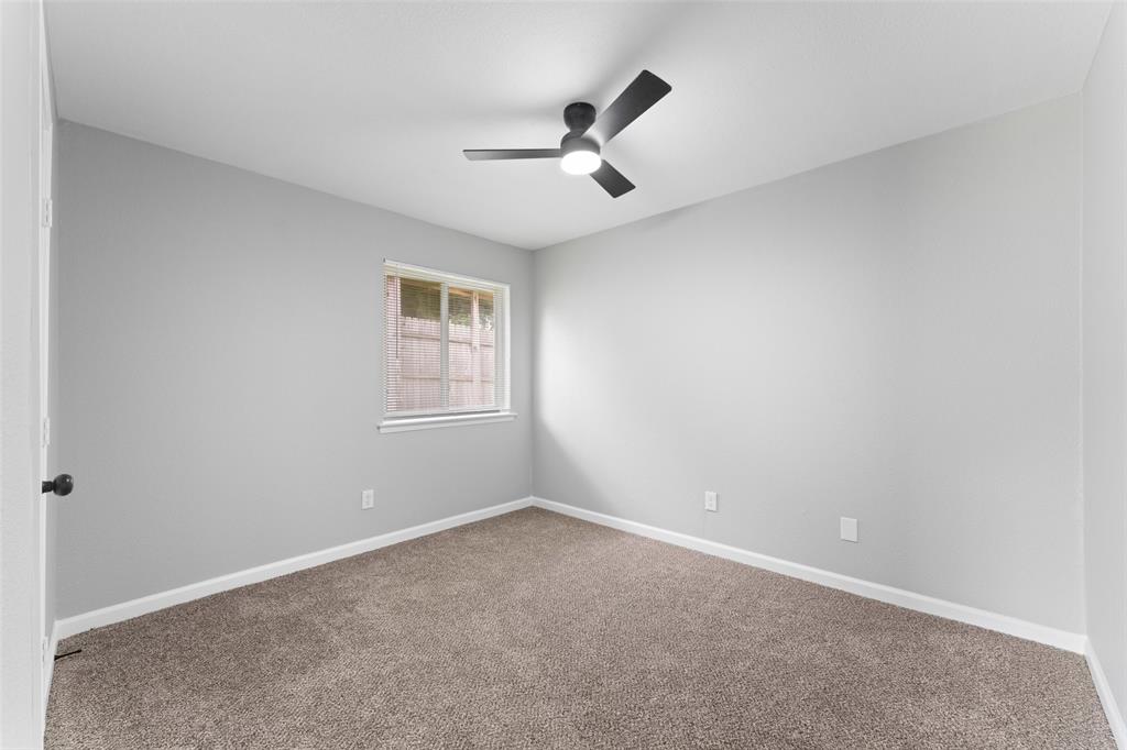1137 Via Balboa Mesquite, TX 75150 - Photo 10 of 15 Empty room with carpet flooring and ceiling fan