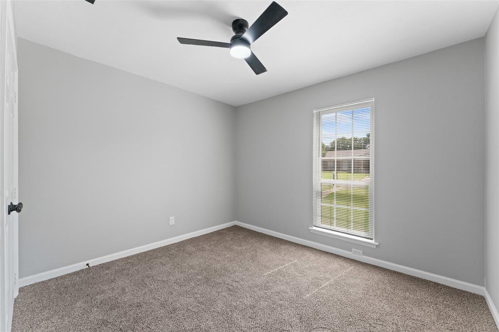 1137 Via Balboa Mesquite, TX 75150 - Photo 9 of 15 Spare room featuring light carpet and ceiling fan