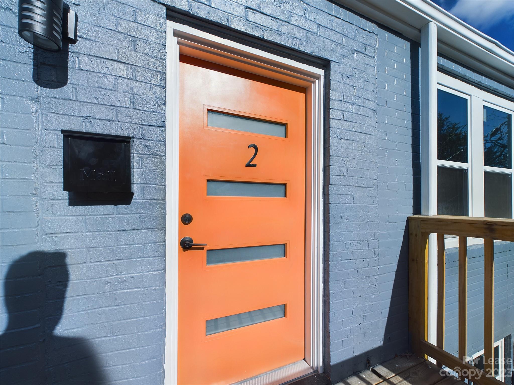 a front view of a house with a door
