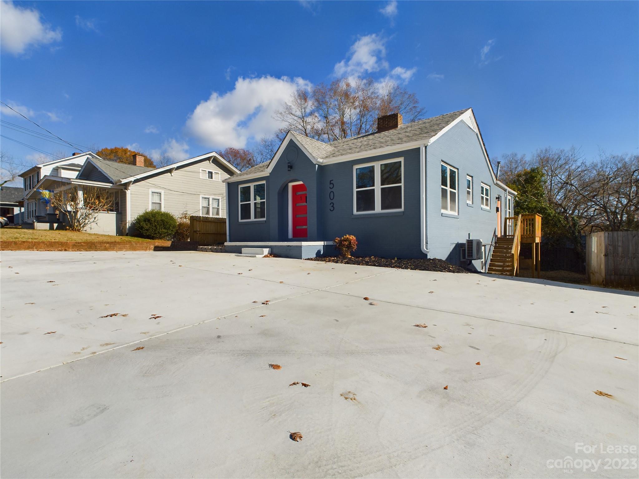 503 5th Street Southwest, Unit 2 Hickory, NC 28602 - Photo 11 of 11 a front view of a house with a yard