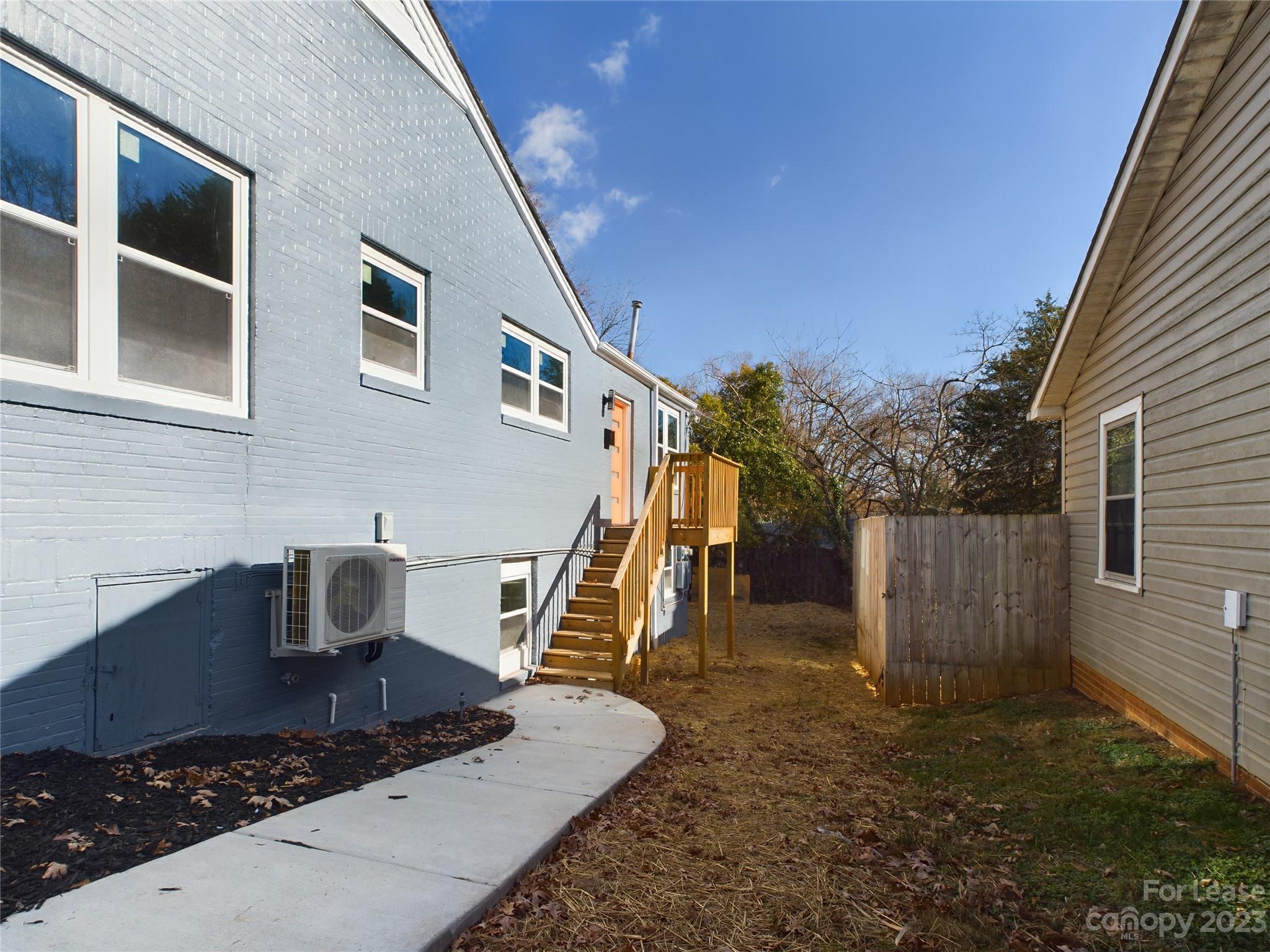 503 5th Street Southwest, Unit 2 Hickory, NC 28602 - Photo 2 of 11 a backyard of a house with barbeque oven