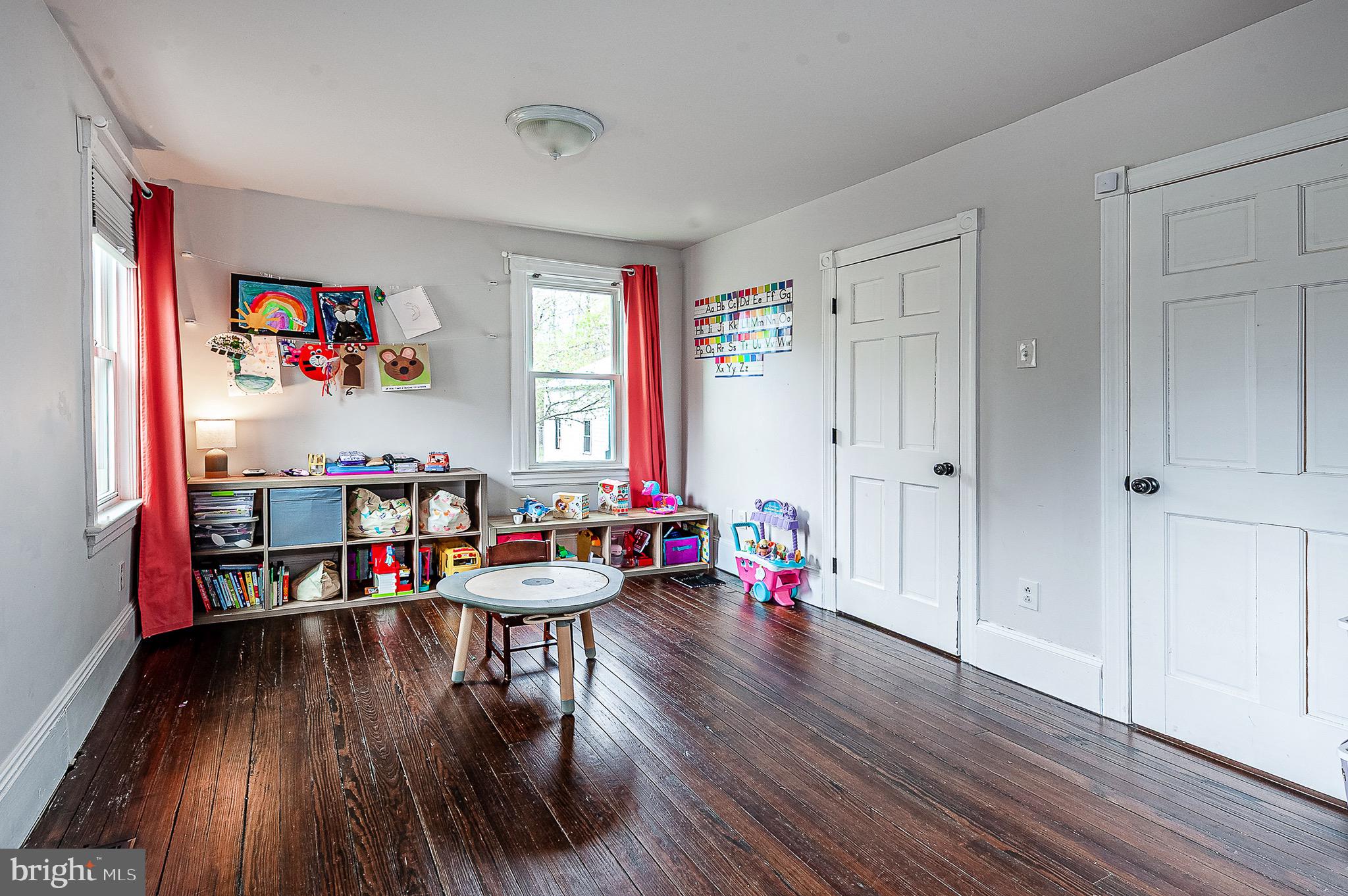 584 Clems Run Mullica Hill, NJ 08062 - Photo 12 of 23 a living room with furniture and a wooden floor