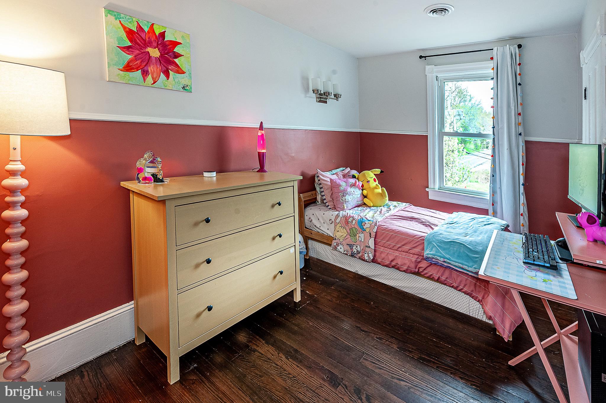 584 Clems Run Mullica Hill, NJ 08062 - Photo 18 of 23 a bedroom with a bed and wooden floor