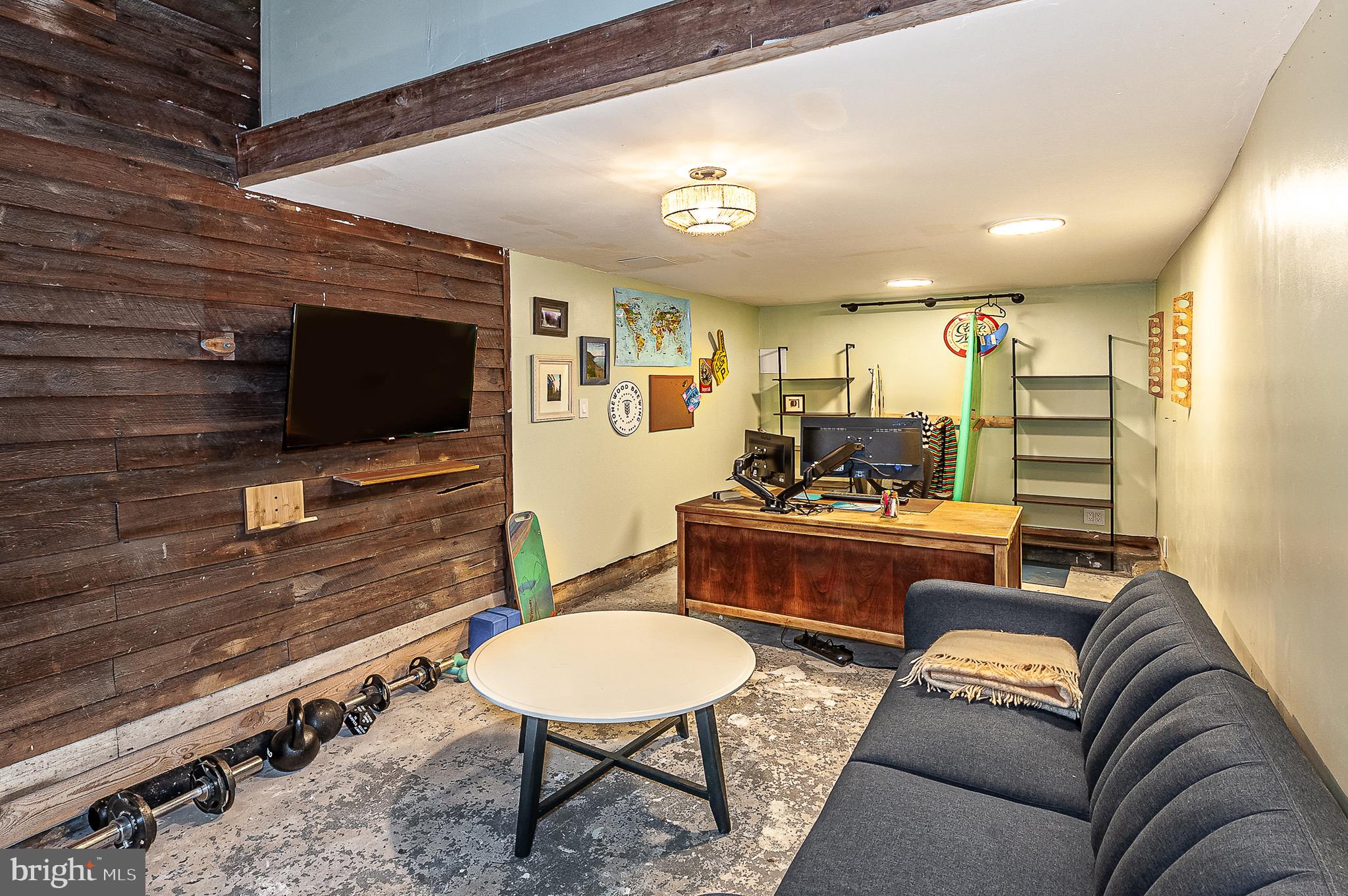 584 Clems Run Mullica Hill, NJ 08062 - Photo 21 of 23 a living room with furniture and a flat screen tv