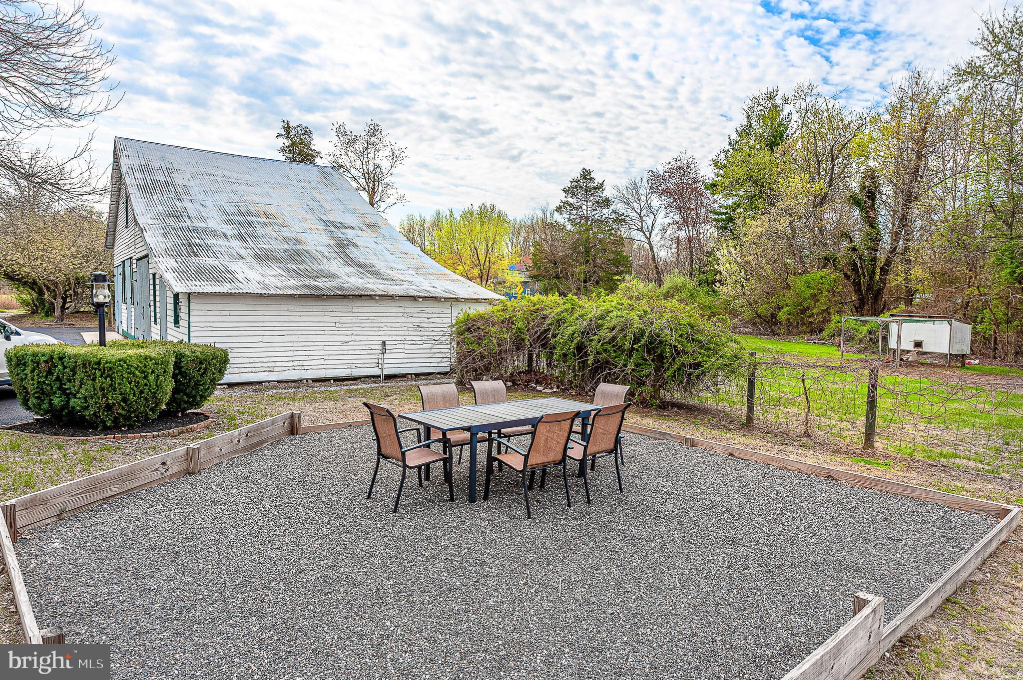584 Clems Run Mullica Hill, NJ 08062 - Photo 22 of 23 a view of a house with backyard and sitting area