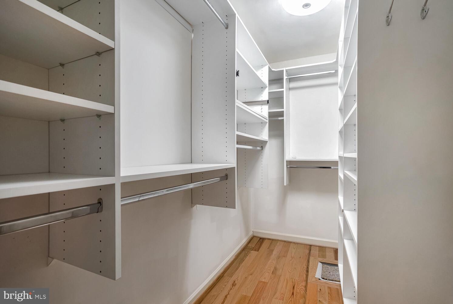 1794 Dawson Street Vienna, VA 22182 - Photo 19 of 30 a view of walk in closet with empty racks