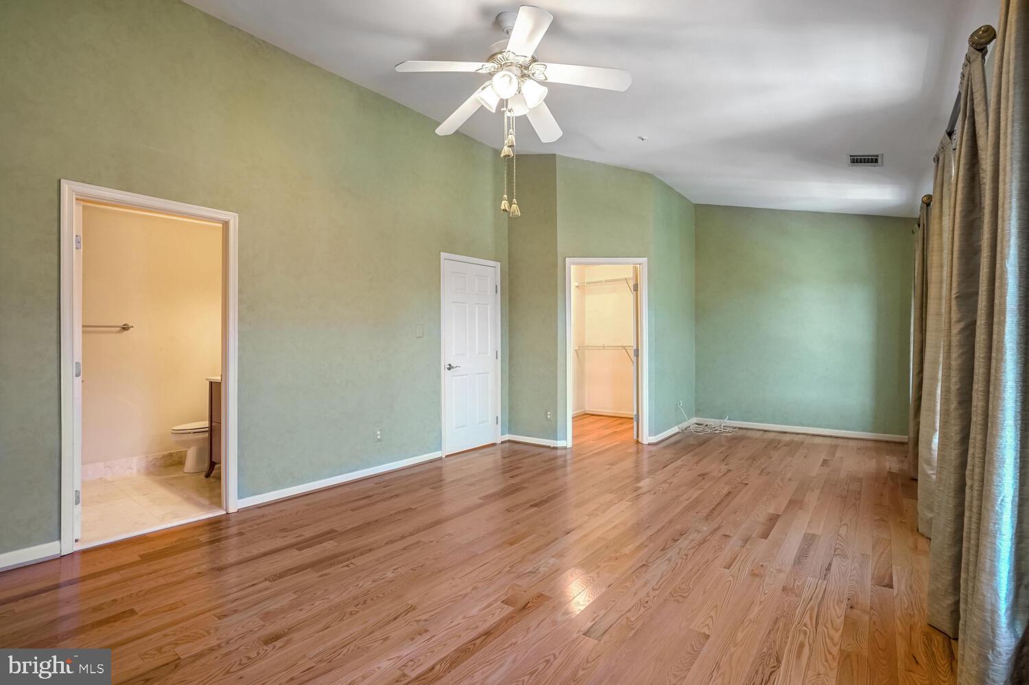 1794 Dawson Street Vienna, VA 22182 - Photo 21 of 30 wooden floor in an empty room with a window