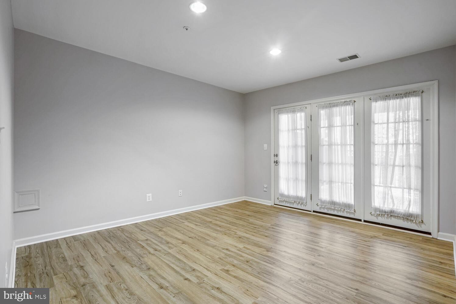 1794 Dawson Street Vienna, VA 22182 - Photo 25 of 30 wooden floor in an empty room with a window