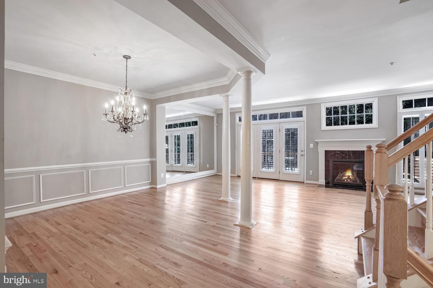 1794 Dawson Street Vienna, VA 22182 - Photo 7 of 30 a view of a livingroom with wooden floor and a kitchen