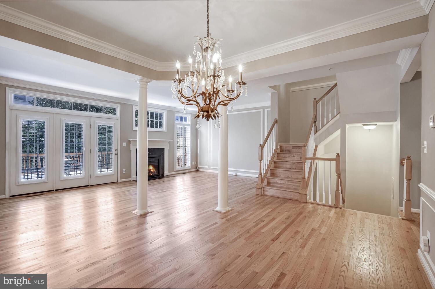 1794 Dawson Street Vienna, VA 22182 - Photo 8 of 30 a view of a livingroom with wooden floor and fireplace
