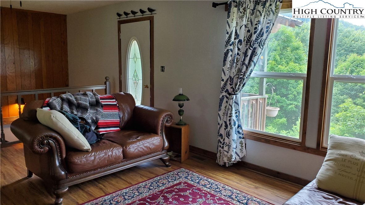 183 Clawson Road Butler, TN 37640 - Photo 6 of 13 a living room with furniture and a window