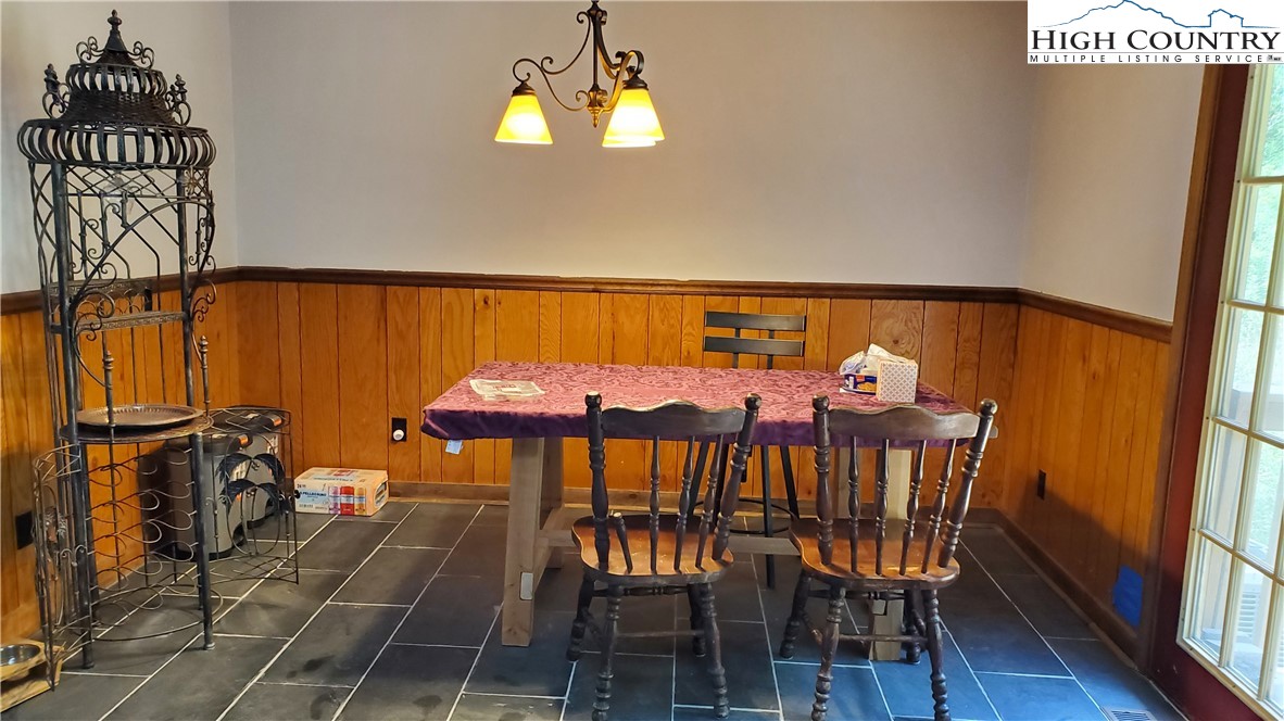 183 Clawson Road Butler, TN 37640 - Photo 7 of 13 a view of a dining room with furniture and wooden floor