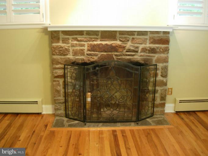 9300 Avondale Road Baltimore, MD 21234 - Photo 20 of 25 Fieldstone fireplace