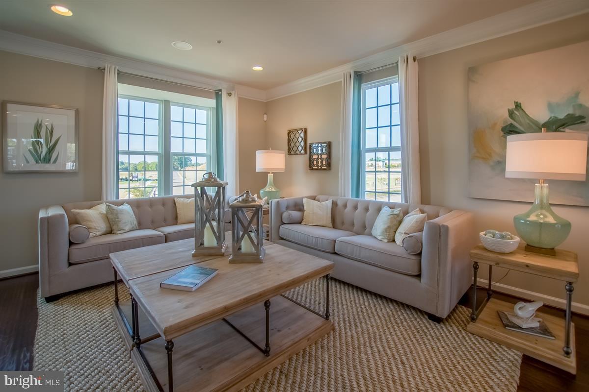 7917 Gladden Farm Way Hanover, MD 21076 - Photo 7 of 27 a living room with furniture and a window