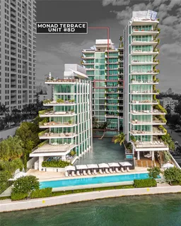 a front view of a building with glass windows and door