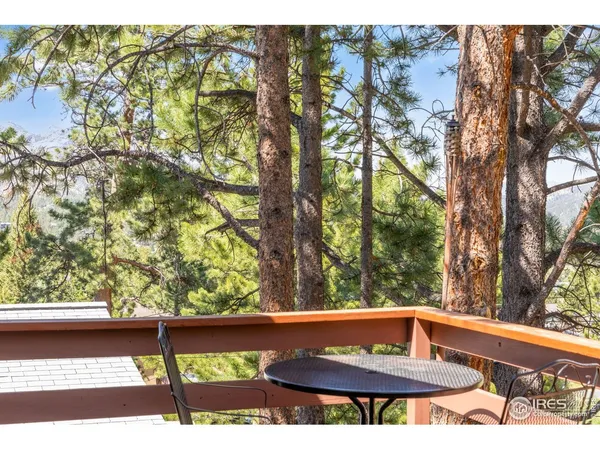 a view of outdoor space with deck and wooden floor
