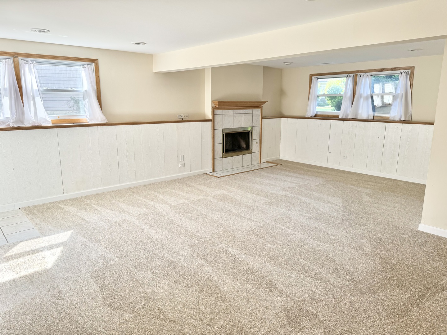 17588 West Summit Drive Grayslake, IL 60030 - Photo 12 of 19 an empty room with windows and fireplace