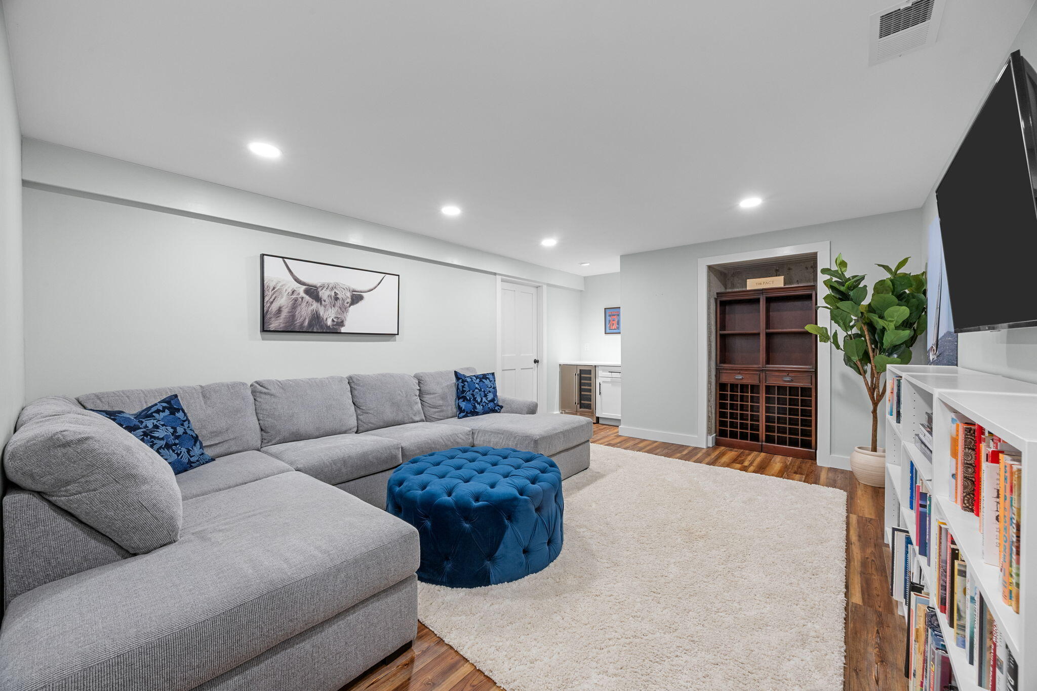 174 Cross Neck Road Marion, MA 02738 - Photo 29 of 41 a living room with furniture and a flat screen tv
