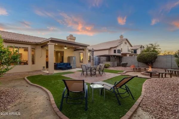 a view of a house with backyard porch and patio