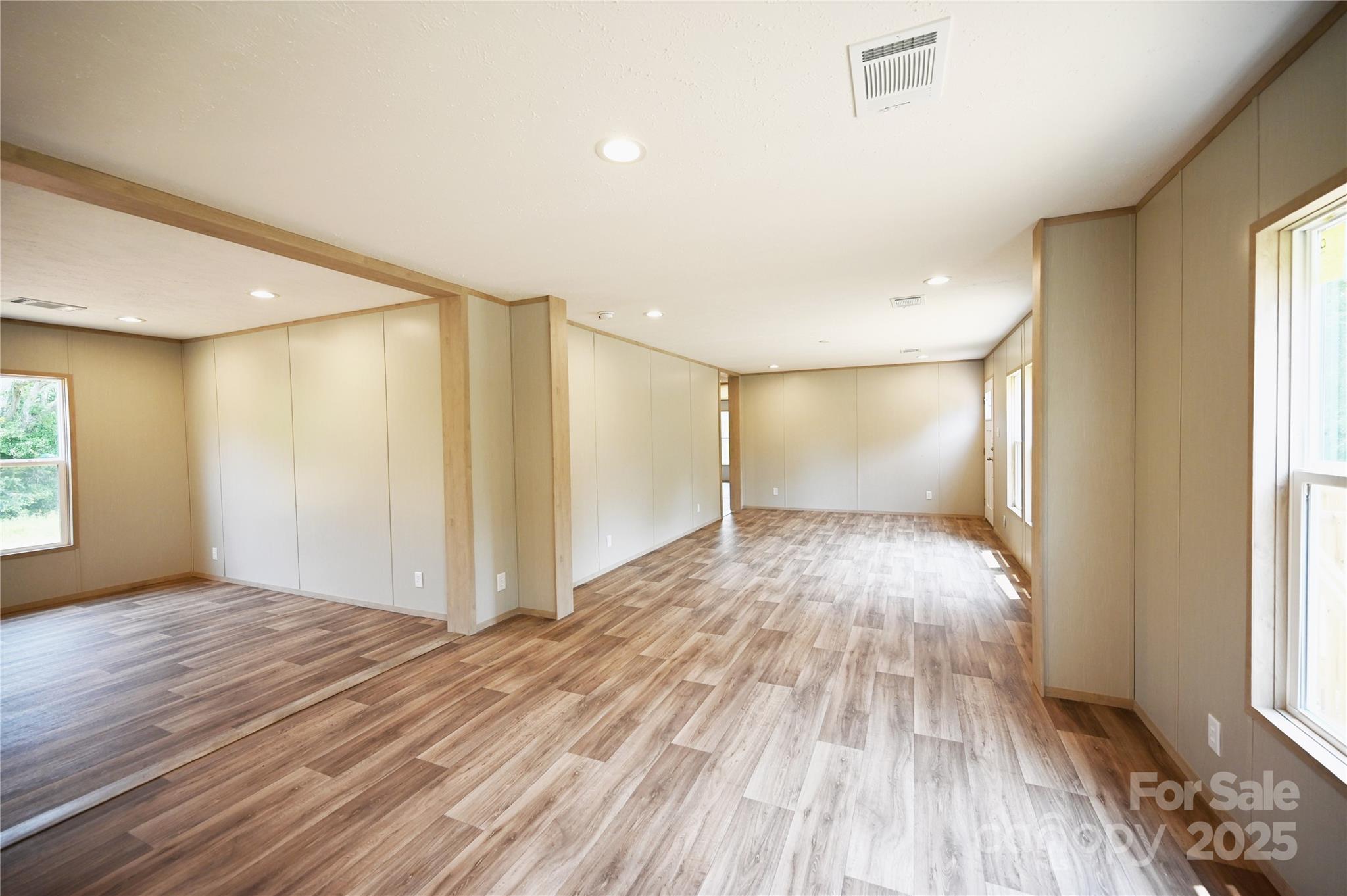 1157 Renno Road Clinton, SC 29325 - Photo 2 of 24 a view of empty room with wooden floor and fan