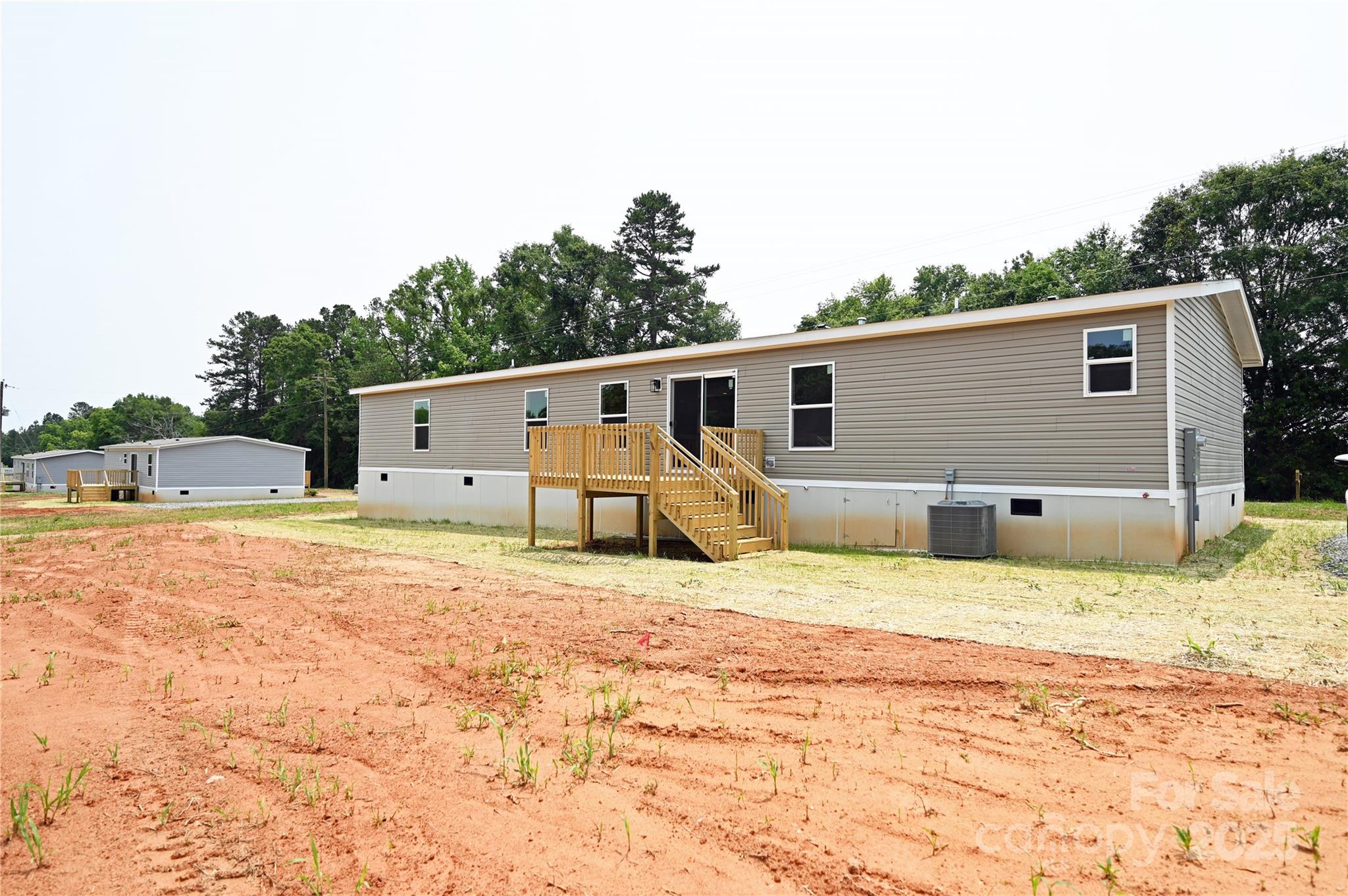 1157 Renno Road Clinton, SC 29325 - Photo 23 of 24 a house with trees in the background
