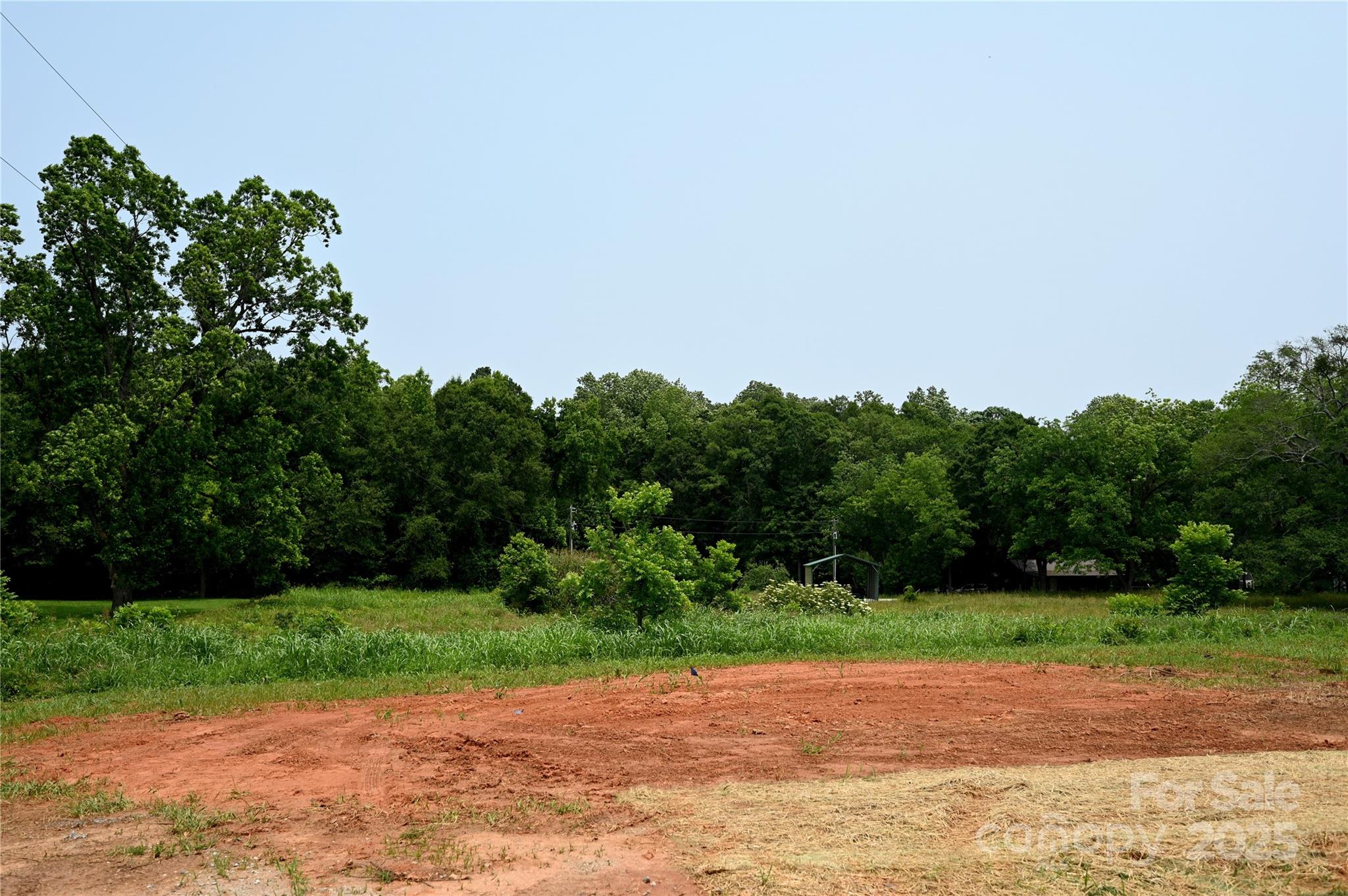1157 Renno Road Clinton, SC 29325 - Photo 24 of 24 a view of a yard with a house in the background