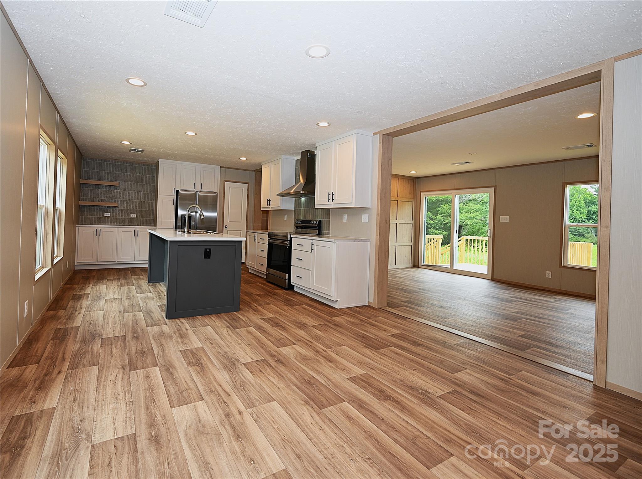 1157 Renno Road Clinton, SC 29325 - Photo 3 of 24 a view of kitchen with wooden floor and electronic appliances