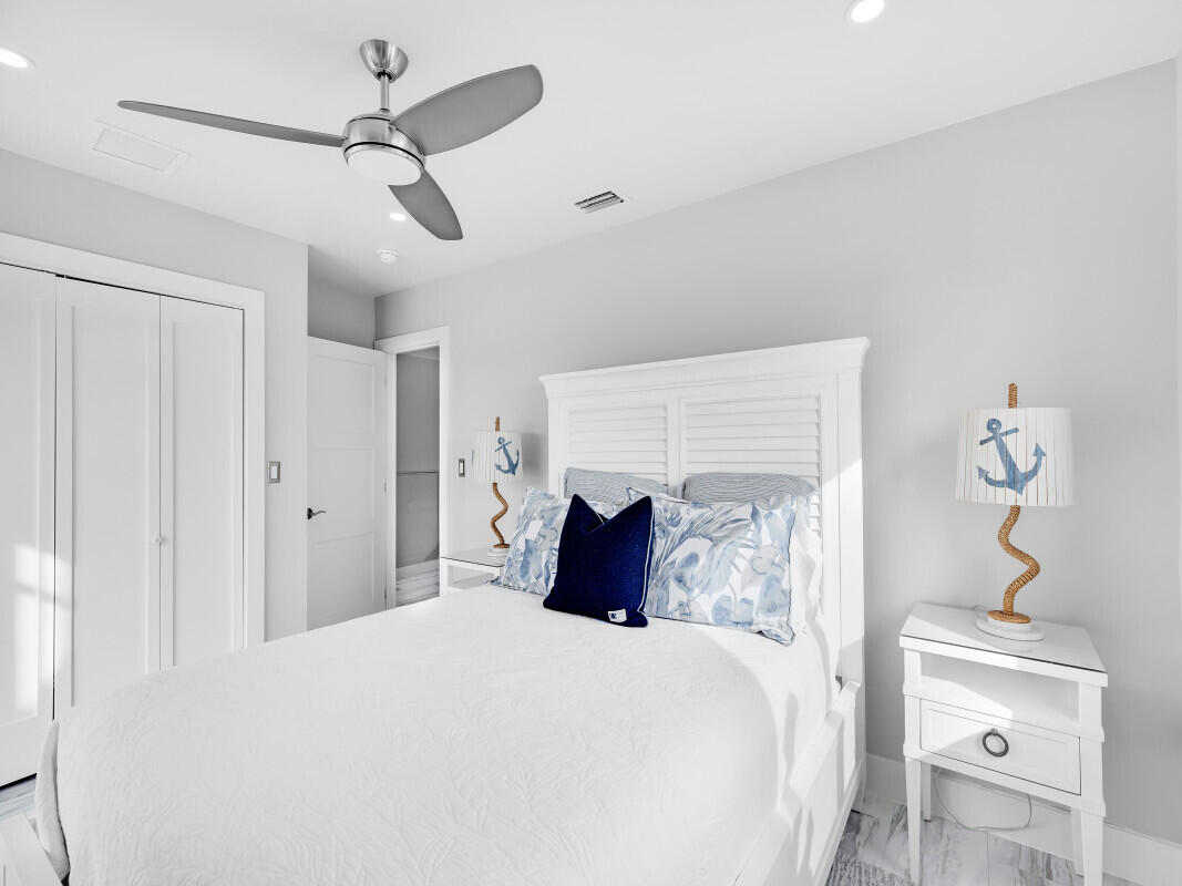325 Calusa Street, Unit 359 Key Largo, FL 33037 - Photo 18 of 52 a bedroom with a bed and window